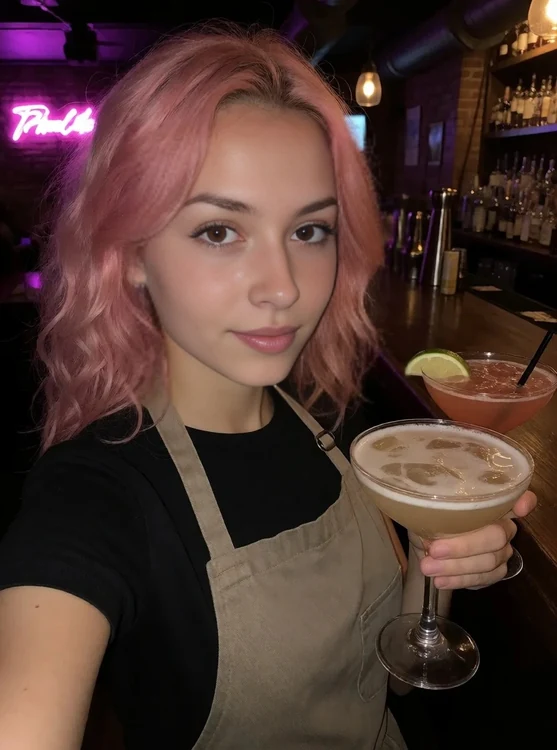 Roxie - Selfie behind the bar, apron over black tee, holding two cocktails, dim neon.